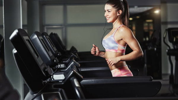 girl gym running treadmill smiling sport earphones wallpaper preview