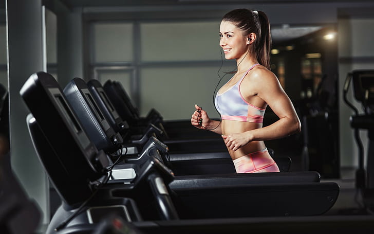 girl gym running treadmill smiling sport earphones wallpaper preview