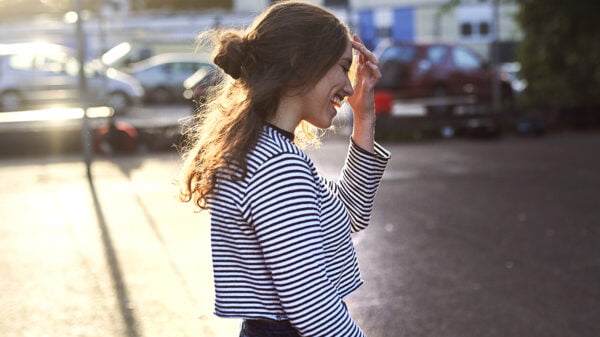 A classic black and white striped shirt with a pair of jeans